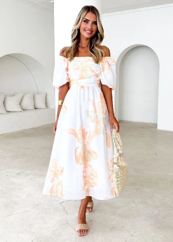 Midi dresses with geometric cutouts for a contemporary and edgy look Pollen Midi Dress - Peach Floral