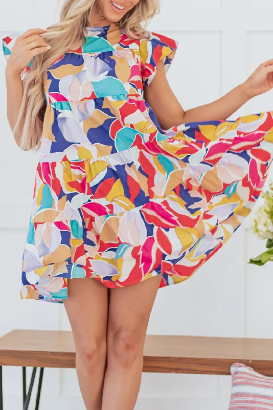 Wrap - style midi dresses in silk for a sophisticated office look Abstract Tiered Mini Dress