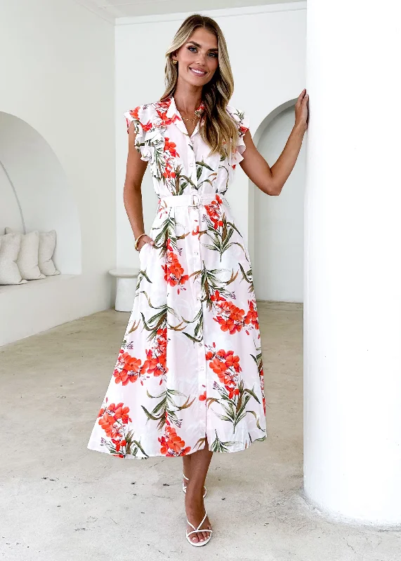 Midi dresses with keyhole backs for a flirty and unexpected detail Tasto Midi Dress - Pink Floral Midi dresses with keyhole backs for a flirty and unexpected detail Tasto Midi Dress - Pink Floral