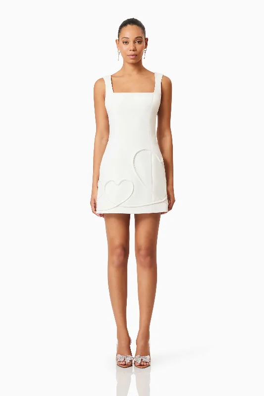 Mini dresses with V - necklines for a flattering shape Buttercup Party Dress in White