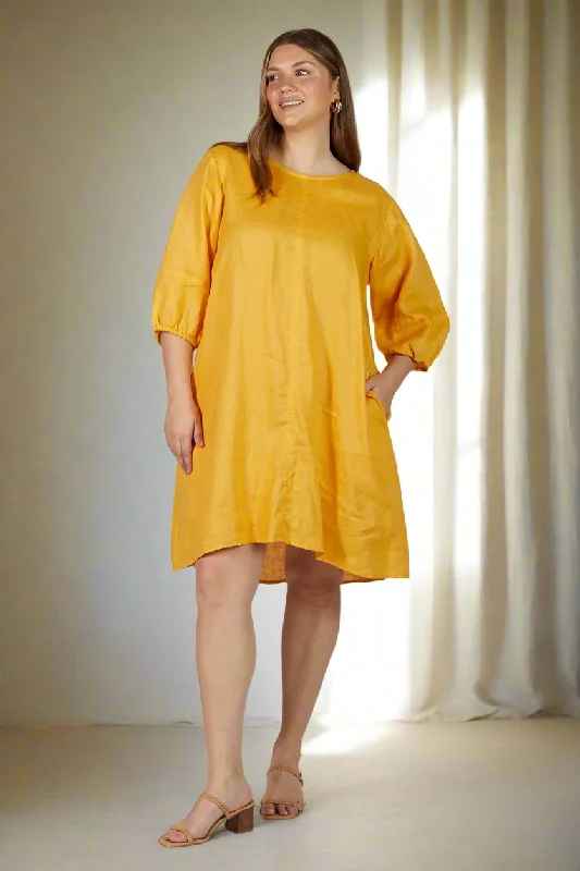 Ruffled Women Dress with Multiple Layers for a Playful and Girly StyleRuffled Women Dress with Multiple Layers for a Playful and Girly StyleHazel Short Shift Linen Dress in Golden Hour