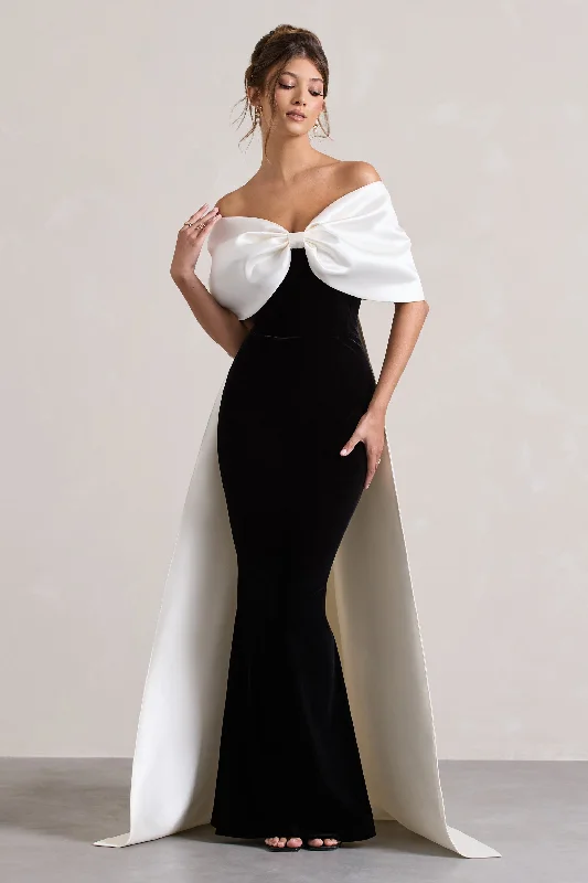 Pleated Women Dress with a Timeless and Elegant TexturePleated Women Dress with a Timeless and Elegant TextureWanting More | Black & White Satin Cape Maxi Dress With Oversized Bow