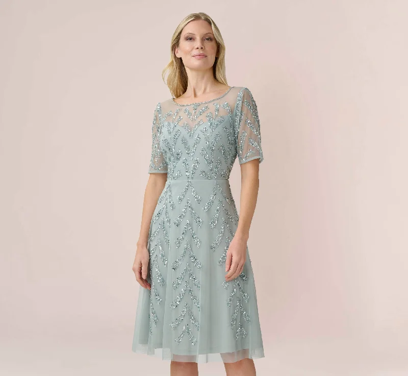Plus Size Women Dress with a Flattering A - Line Cut for Comfort and StylePlus Size Women Dress with a Flattering A - Line Cut for Comfort and StyleHand-Beaded Illusion Midi-Length Fit-And-Flare Cocktail Dress In Frosted Sage