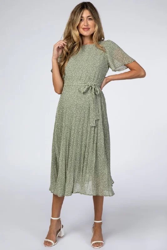 Printed Abstract Women Dress for a Modern and Artistic Appeal Printed Abstract Women Dress for a Modern and Artistic Appeal Light Olive Leaf Print Pleated Maternity Midi Dress