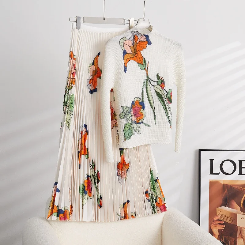 Ruffled Bodysuits with a Playful and Feminine TouchMiyake Pleated Floral Print Top and Skirt Set