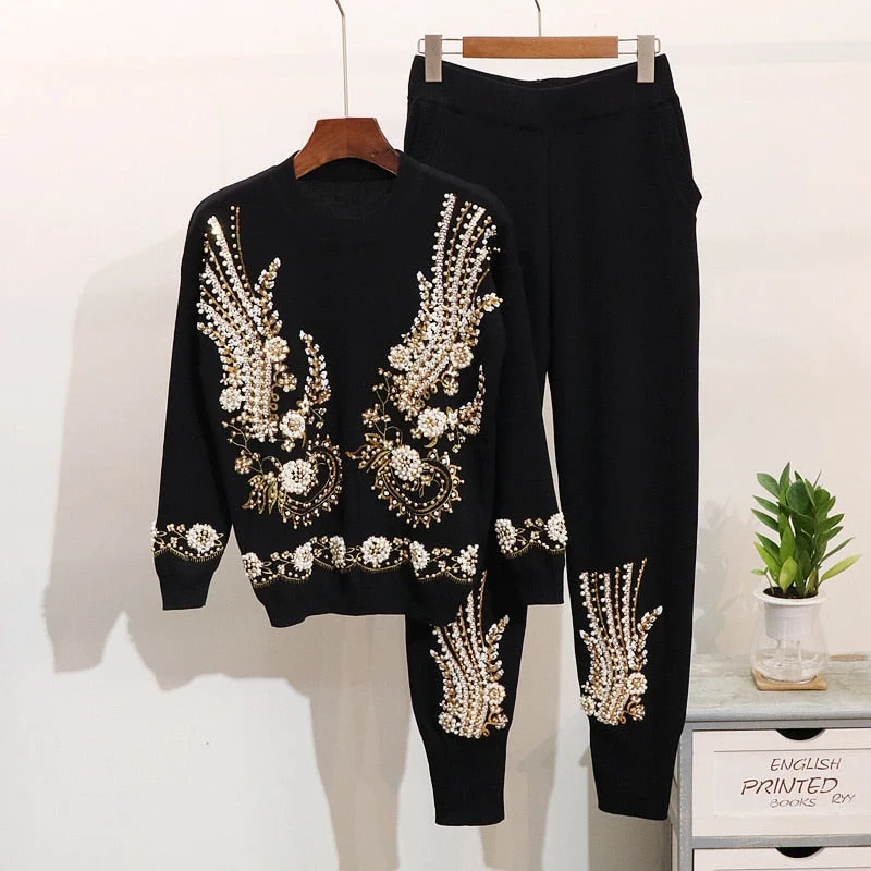 Ruffled Bodysuits with a Playful and Feminine TouchEmbellished Knitted Pullover Sweater and Pants Set