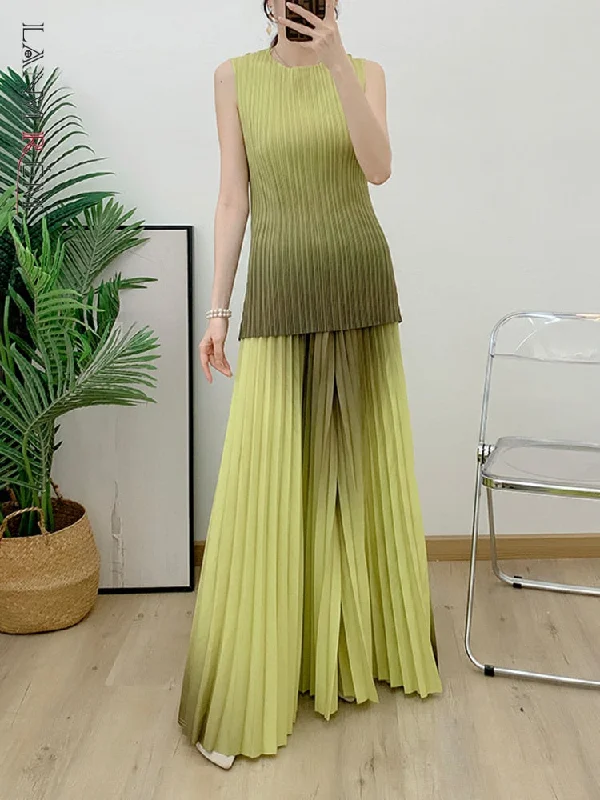 Mesh Bodysuits for a Bold and Edgy Fashion StatementMiyake Pleated Gradient Top and Wide Leg Pants Set