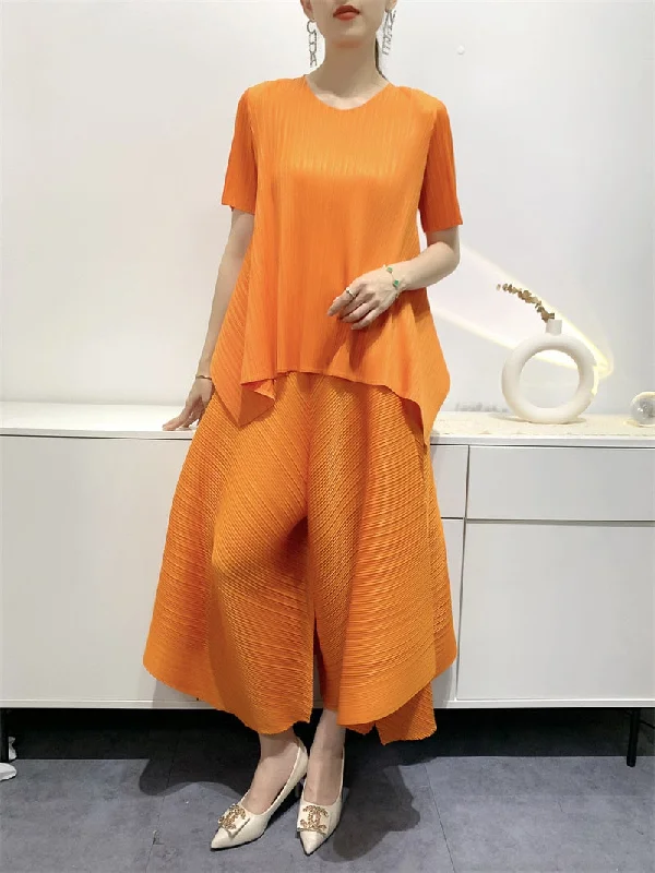 Seamless Bodysuits for a Smooth Underwear LookMiyake Pleated Irregular Hem Top and Cropped Pants Set